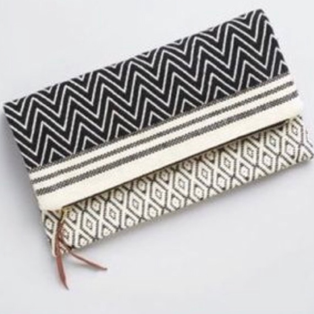 NWOT Artisan-made, reversible fold over clutch.